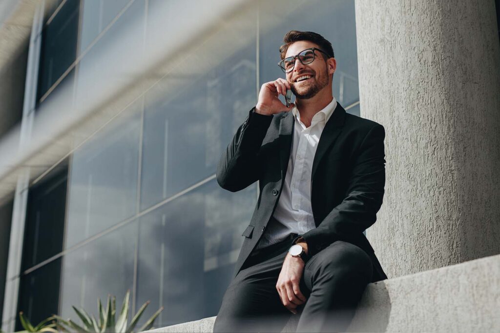 business-man-outside-talking-on-phone